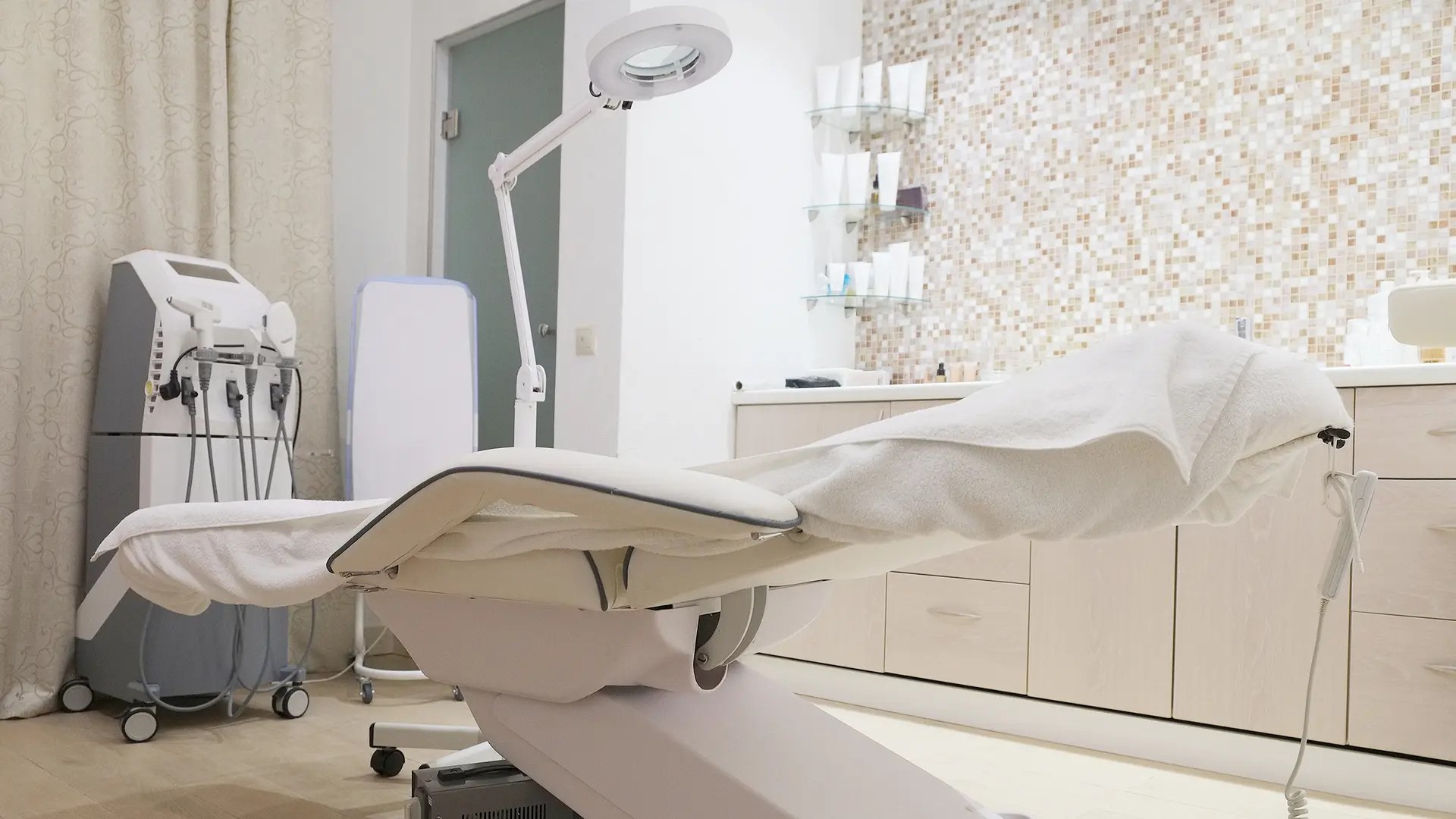 Bright laser hair removal treatment room (illustrative image)